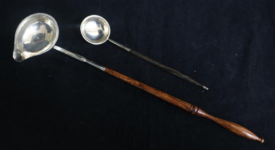 An 18th century silver toddy ladle with later handle and a later 19th century Scottish silver cream ladle.